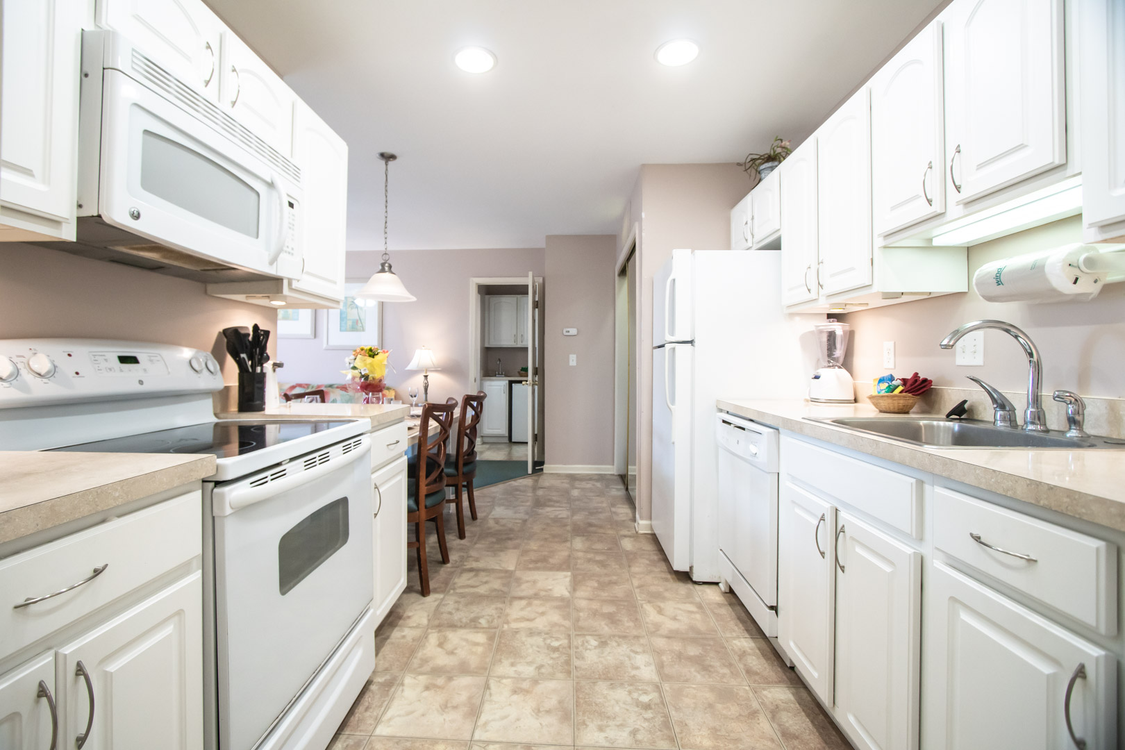 A vibrant and fully equipped kitchen at VRI's Club Ocean Villas II in Ocean City, Maryland.